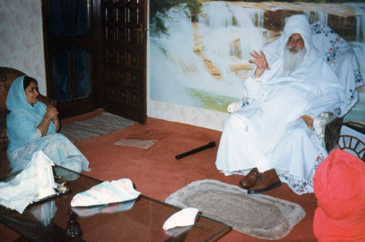 Bibi Gurcharan Kaur listens to Maharaj